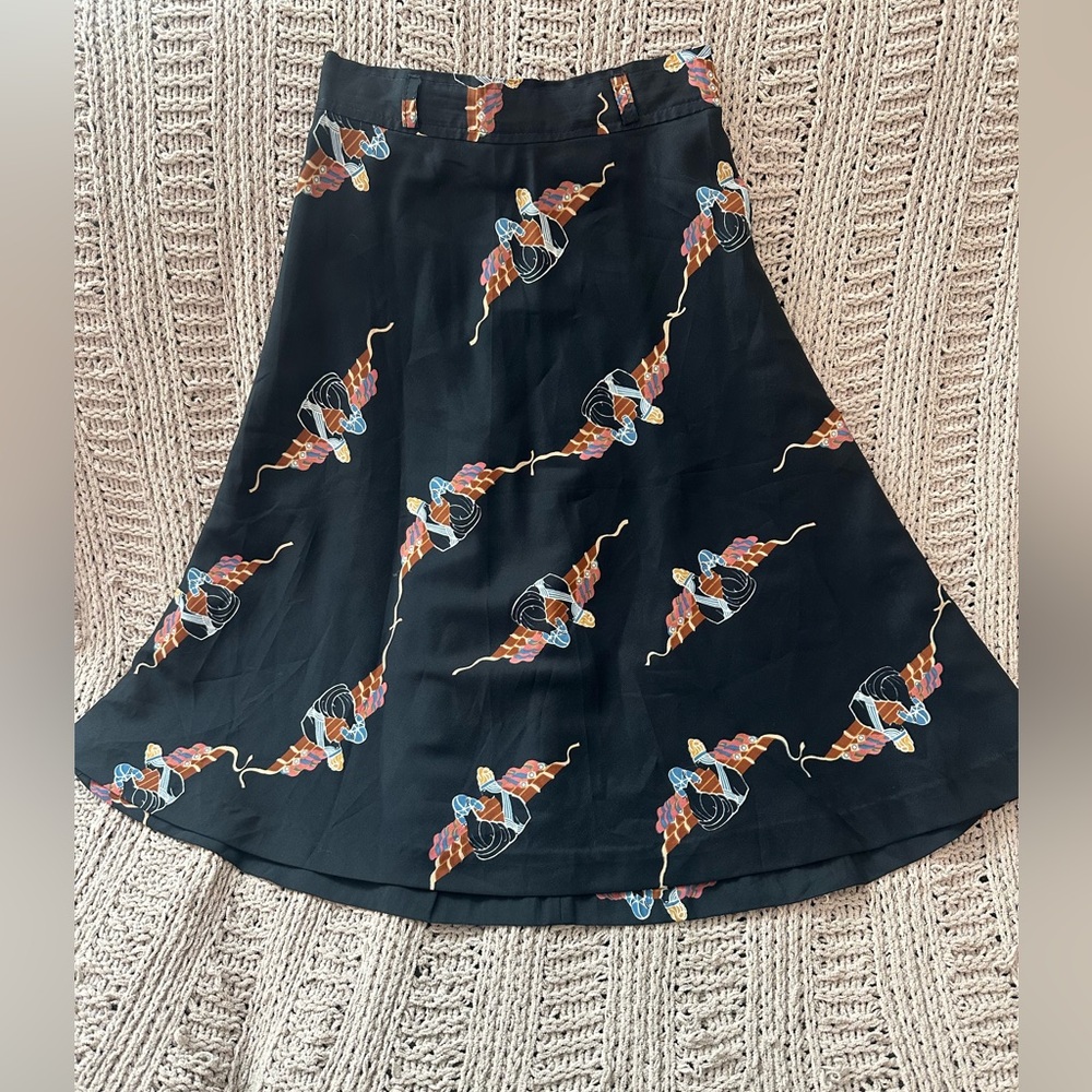 Vintage Jean Nicolas black skirt with Roman/Grecian art pattern